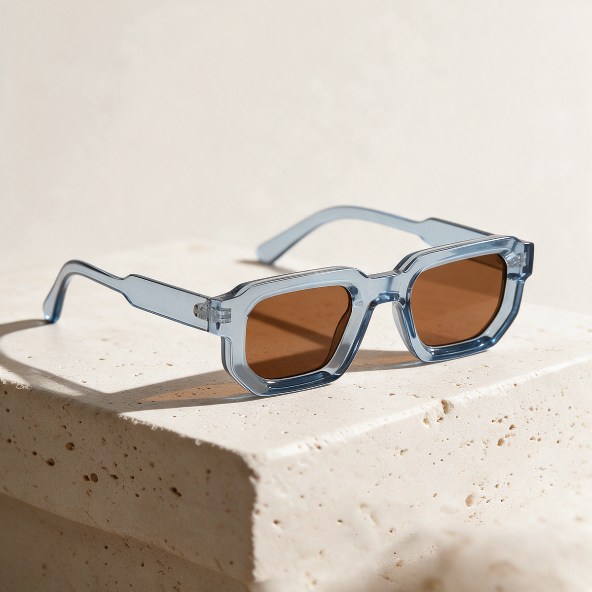 Facette, Montatura Blu ghiaccio · Lenti Marrone
