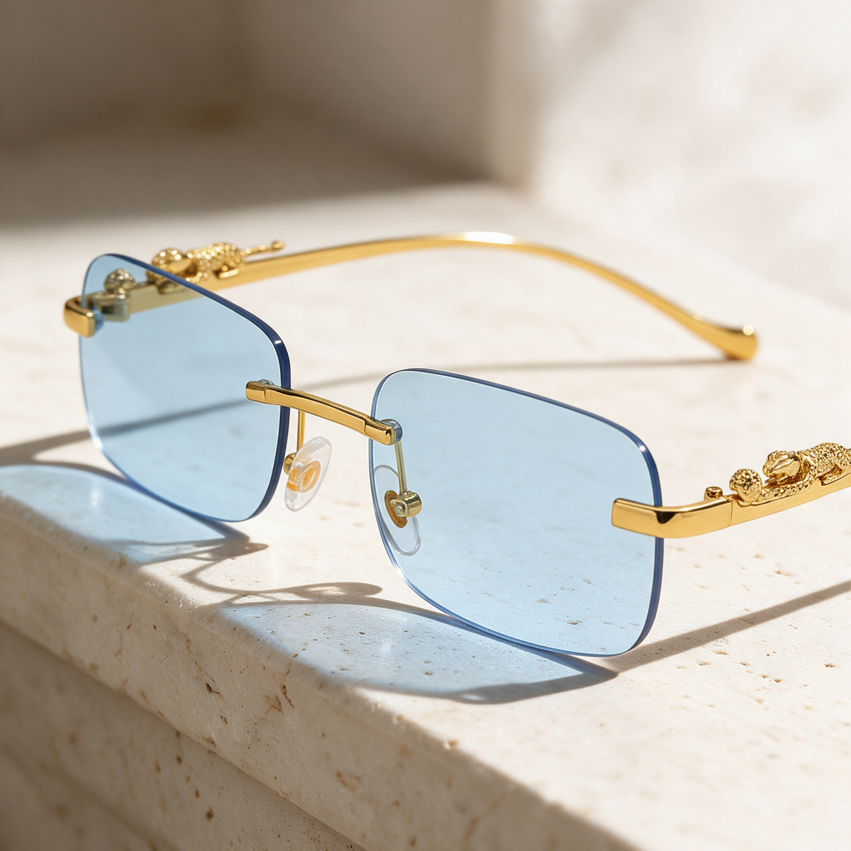 Heliodor, Frame Gold · Lenses Light Blue